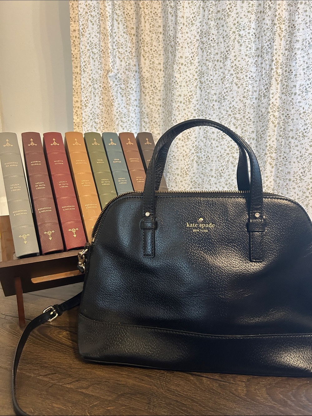 kate spade black leather satchel with gold logo